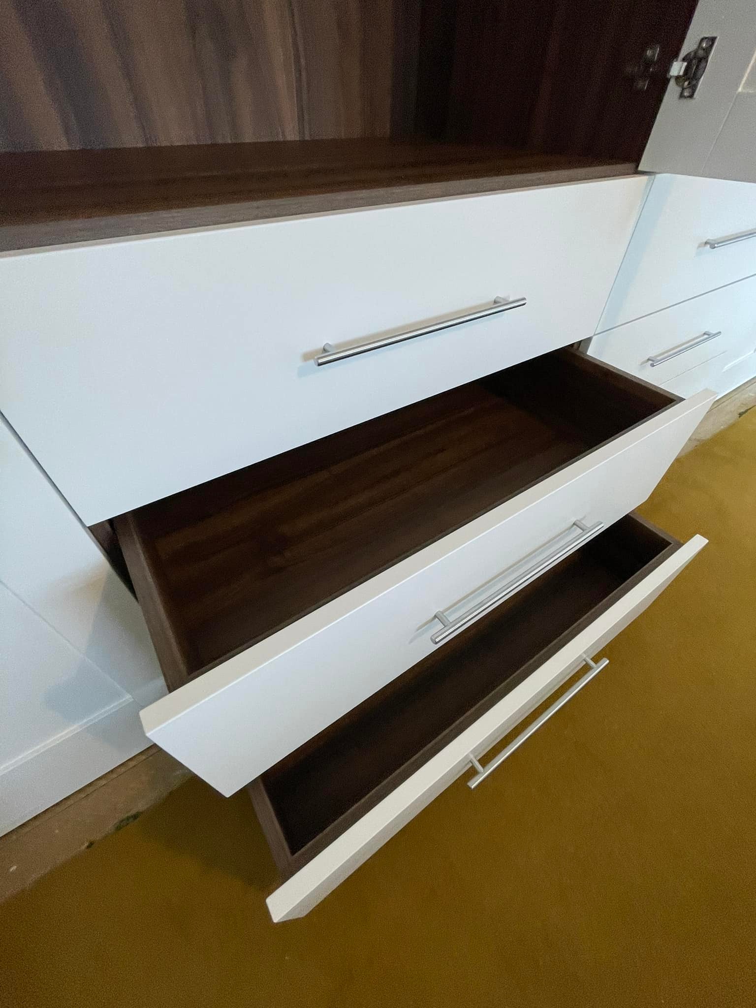 built in drawers in brilliant white with walnut effect interiors