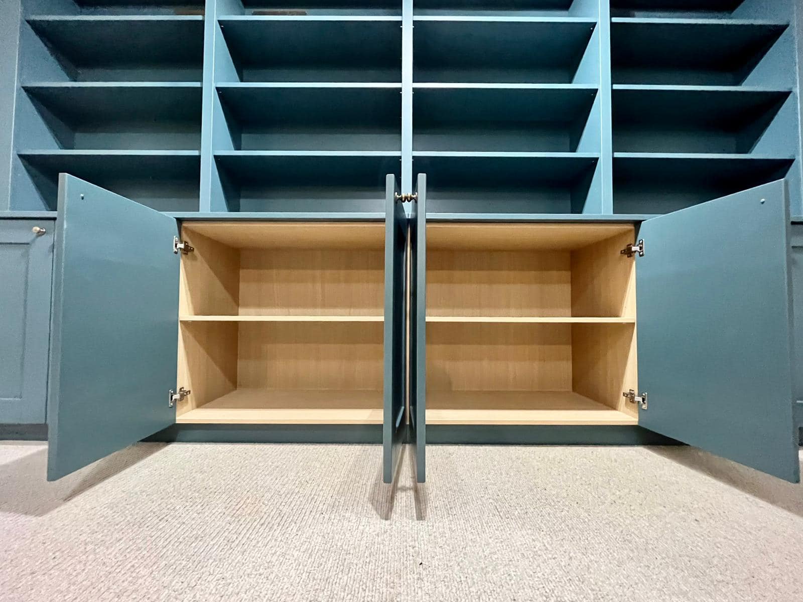 Built in bookshelf colour F&B Inchrya Blue with oak interiors
