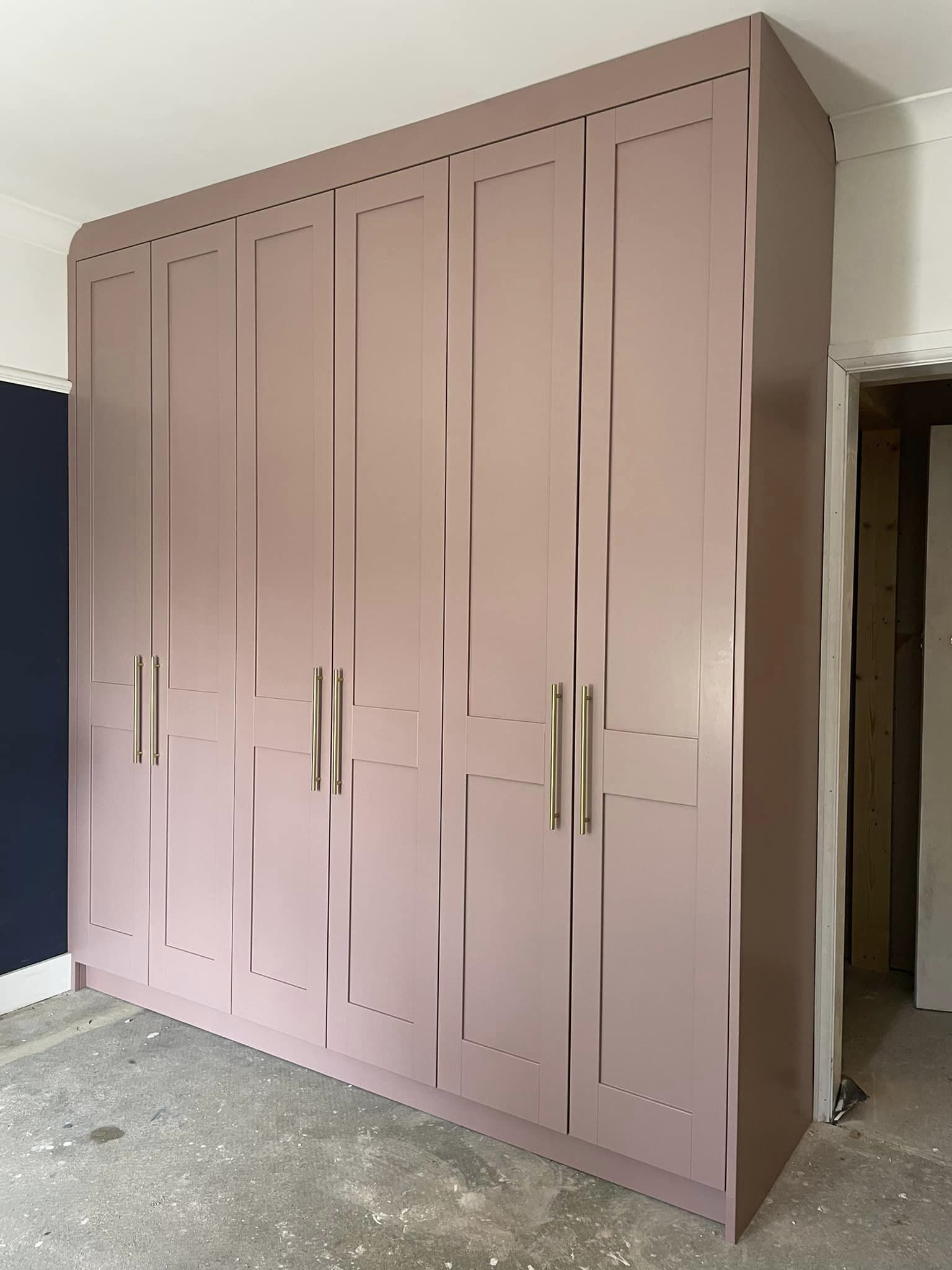 3 double door fitted wardrobe in lovely pink and brass handles